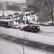 A snow plow careening towards a police cruiser. Photo: Willem Shepherd/Facebook (screengrab)